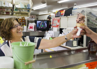 Cini serving hand-dipped, hard ice cream!  Jilbert's Ice Cream